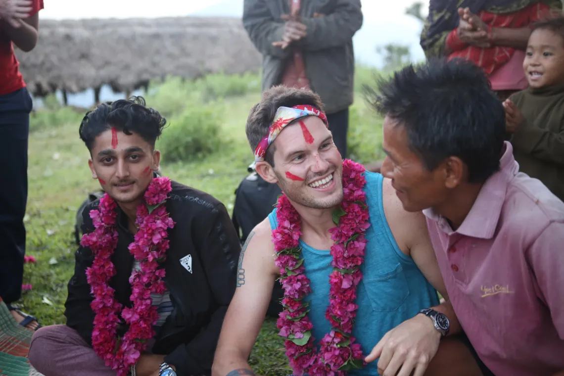 MDP student sitting with his collaborators in Nepal, summer 2019